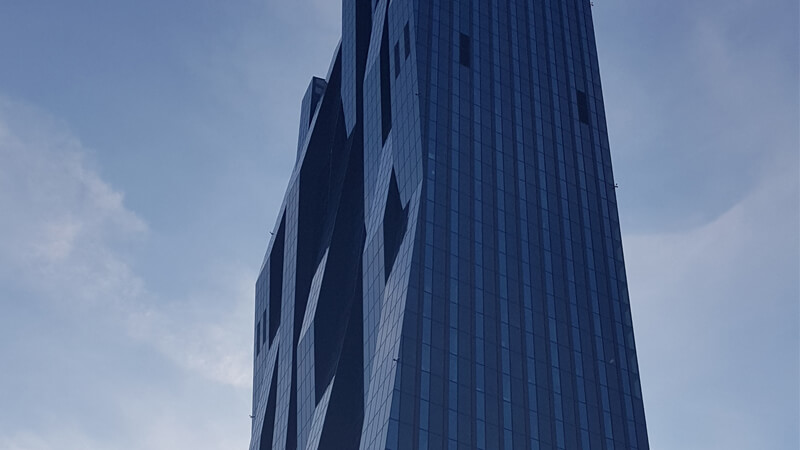 Learning any foreign language is like climbing a tall building (photo: DC Tower in Vienna)